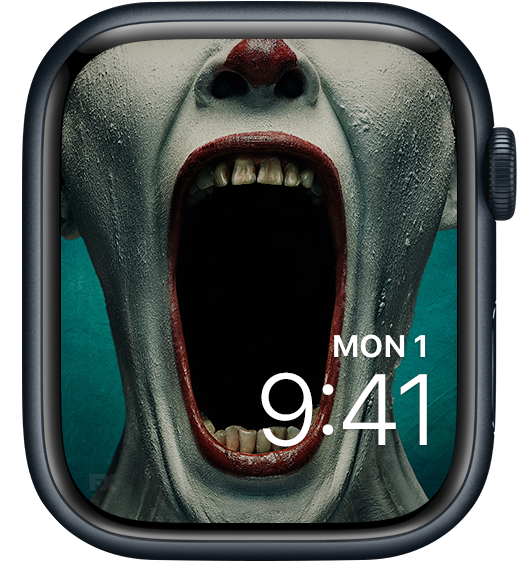 Apple Watch lock screen of clown in white makeup and red lipstick opening jaw wide in FX's AHS Freak Show