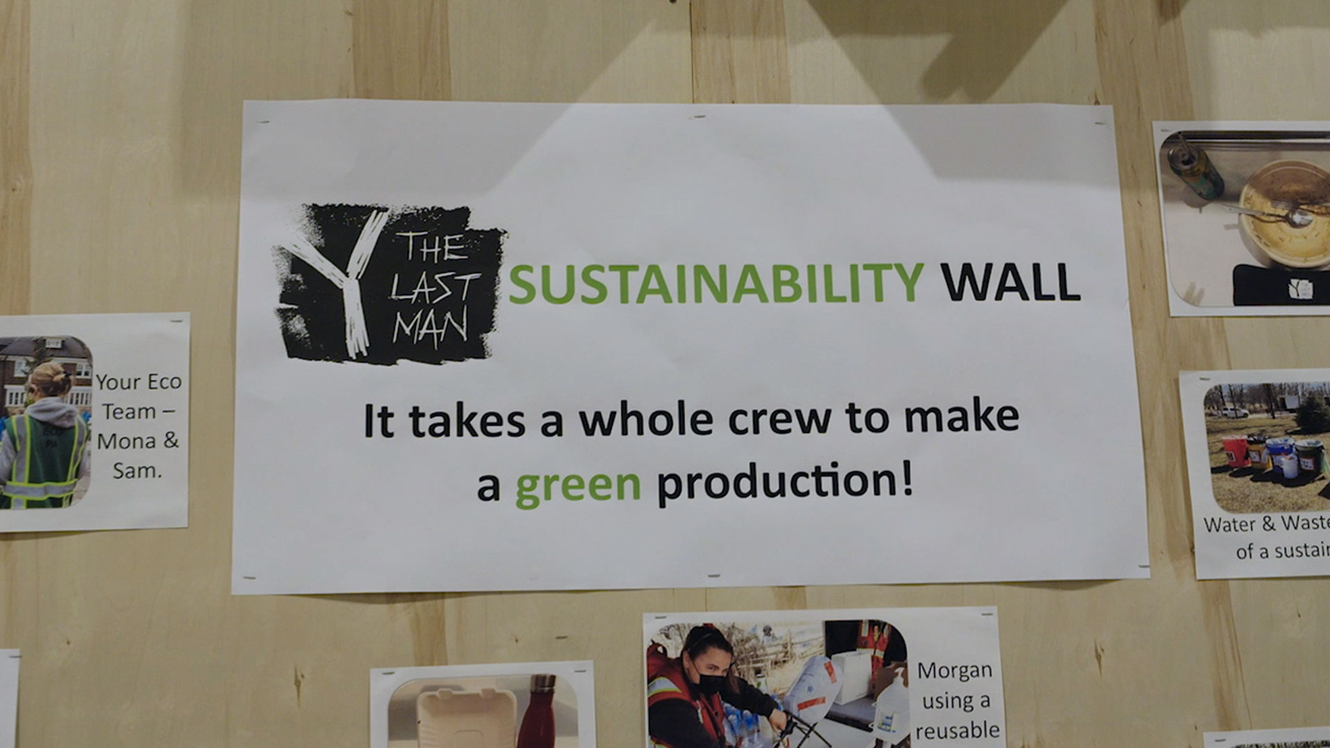 Sign taped to a wall saying "Sustainability wall It takes a whole crew to make a green production"