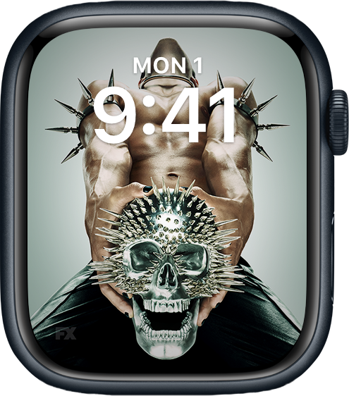 Apple Watch lock screen of man with black pants and spikes on arms clenching spiked metal skull for AHS NYC