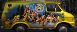 Spray painted Always Sunny characters on the side of a yellow van, dressed in cavemen furs on a city street.