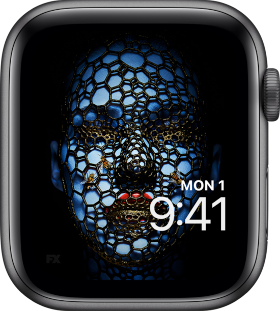 Apple Watch lock screen of blue woman with red lipstick covered in honeycomb pattern net and bees from FX's AHS Cult