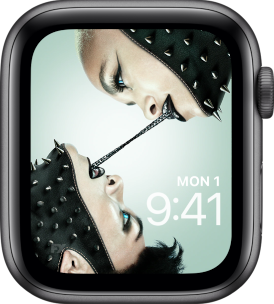 Apple Watch lock screen of two blue-eyed people with black metal chain from their mouths from FX's AHS NYC