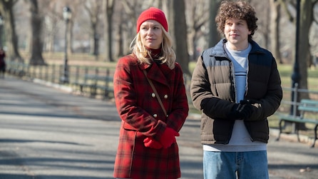 Claire Danes as Rachel in red outfit walking with Jesse Eisenberg as Toby in empty park in FX's Fleishman Is In Trouble