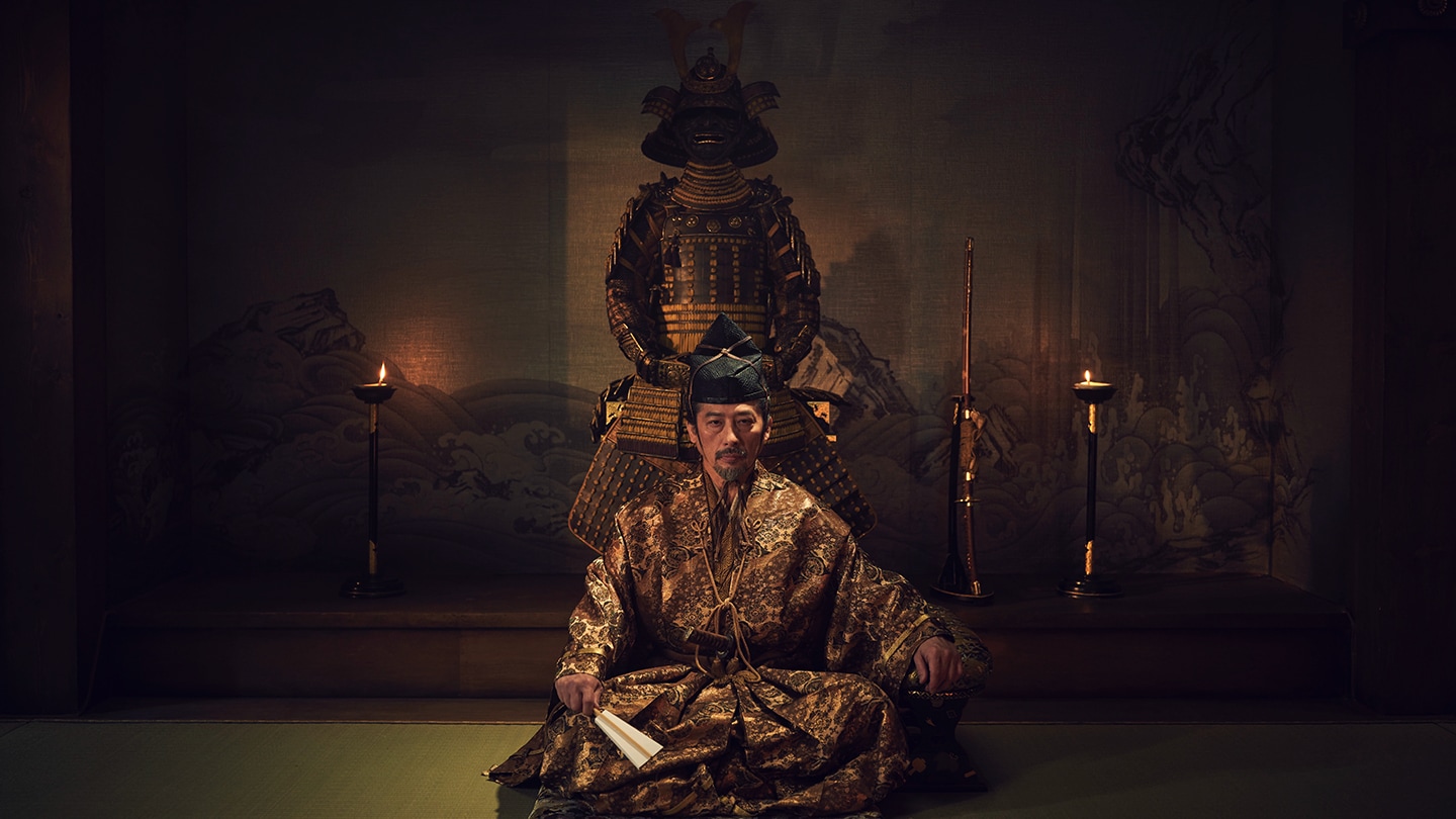 Lord Toranaga sitting in front of his armor at Osaka Castle at night in FX's Shogun