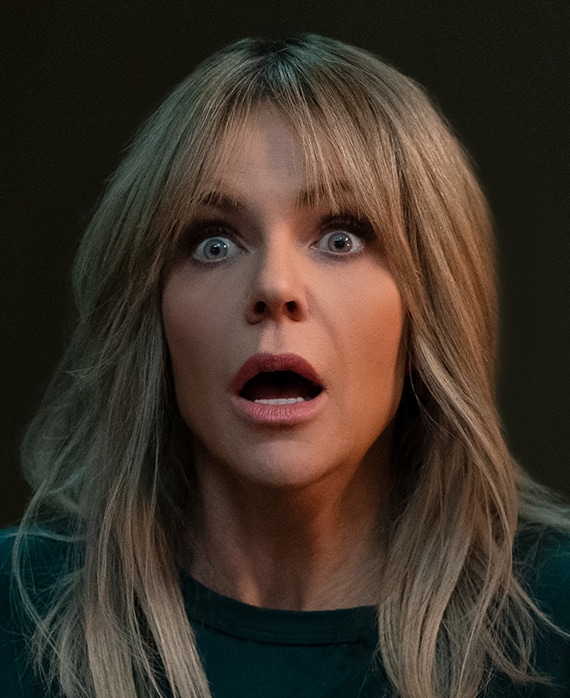 Kaitlin Olson headshot wearing a black shirt
