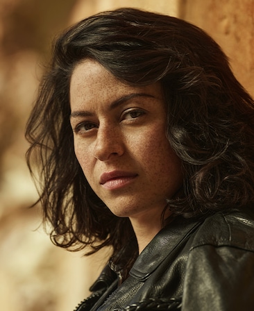 Alia Shawkat headshot wearing a black jacket