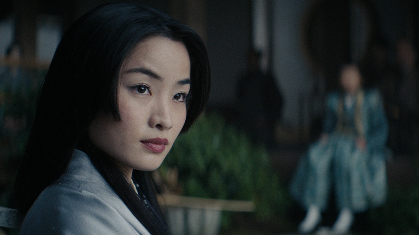 Mariko in the garden with the Heir in the background