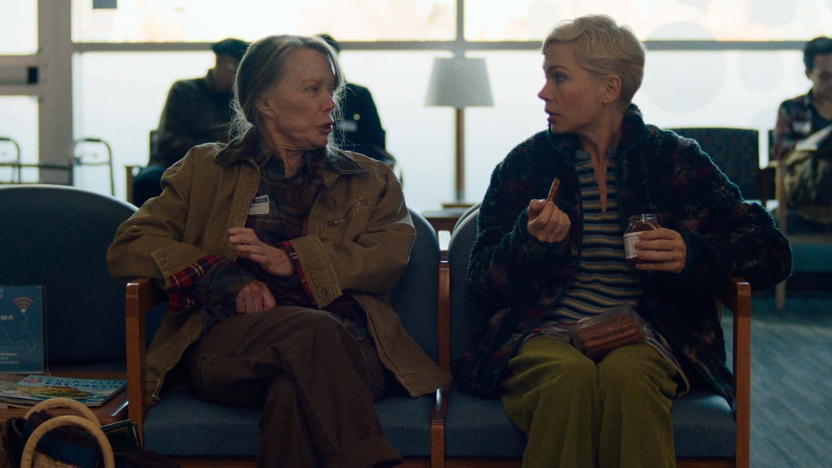 Molly and Gail sitting and looking at each other. 