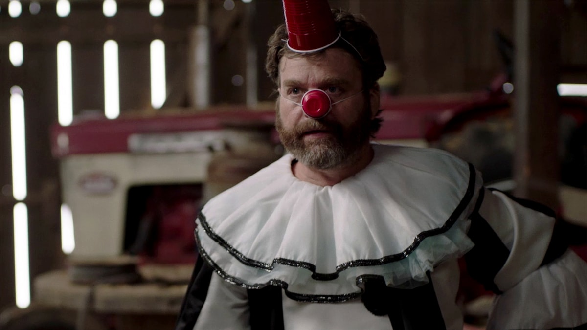 Chip Baskets wearing a clown costume and a red cup over his nose and head.