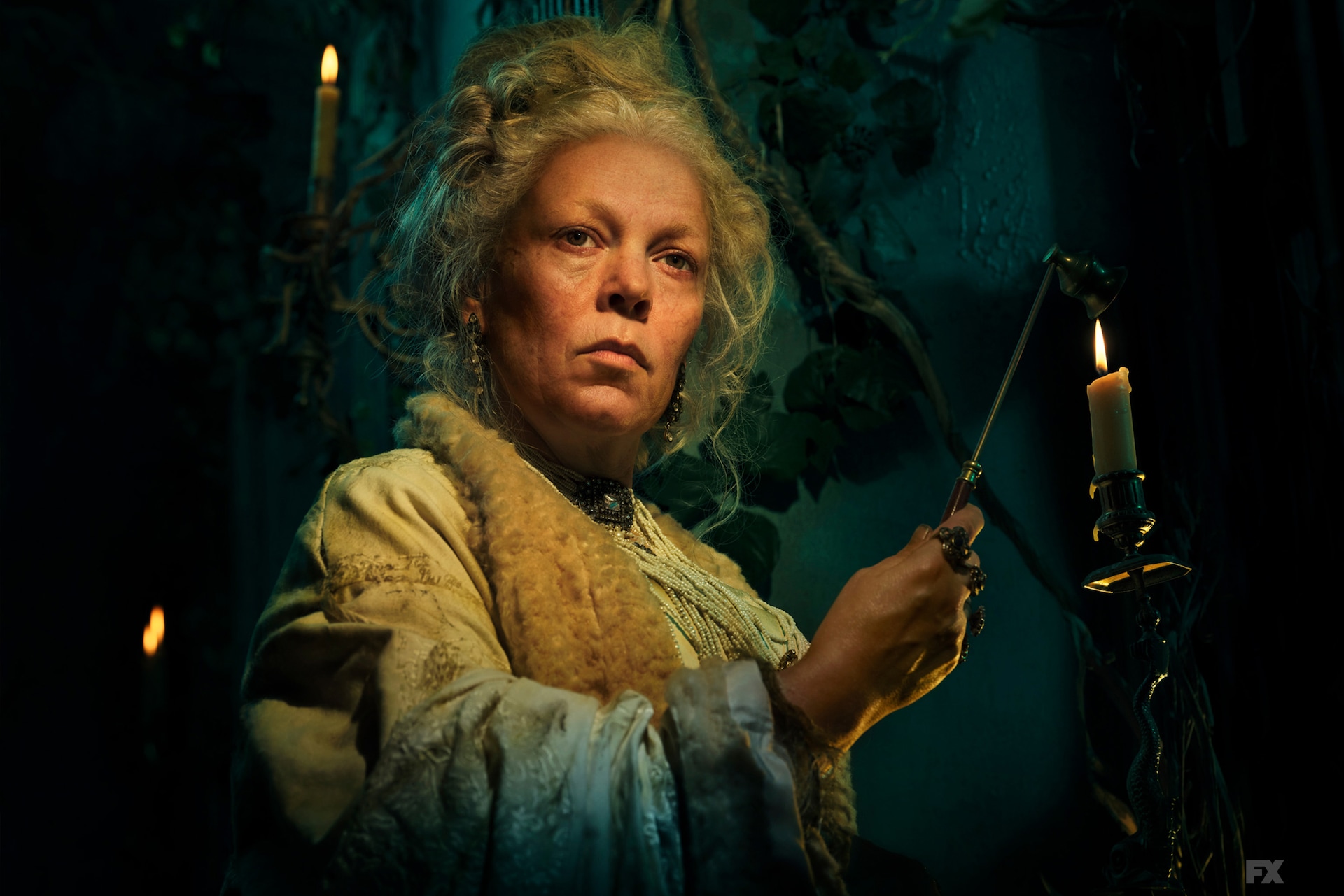 Olivia Colman in costume giving a serious look for Great Expectations