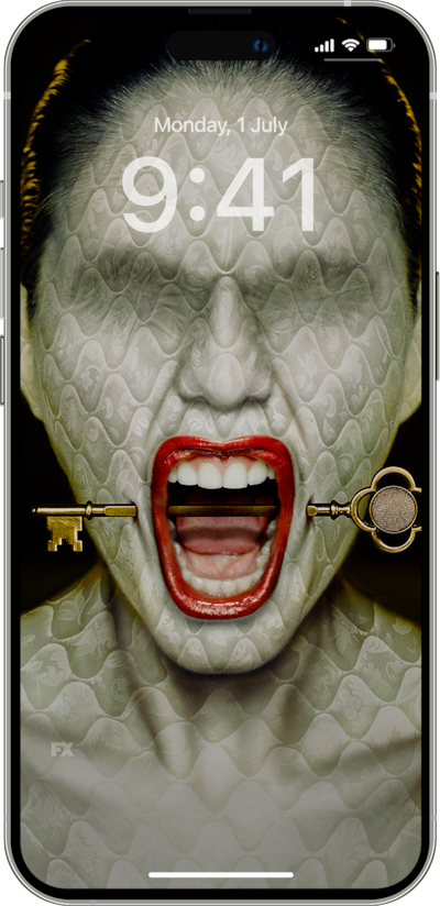 iPhone lock screen of woman wearing red lipstick with mattress texture skin with hotel key through mouth from FX's AHS Hotel
