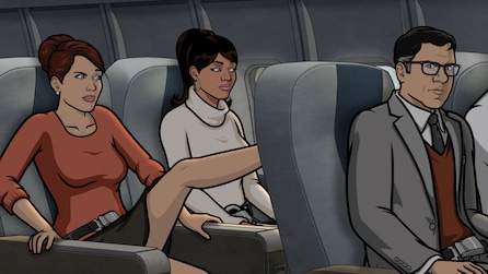 Cheryl, Lana and Cyril on an airplane, while Cheryl pushed Cyril's seat with her leg.