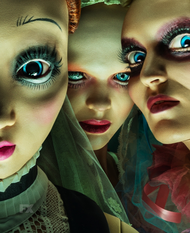 Dolls with wide eyes and colorful garments and makeup from FX's American Horror Stories Installment 2