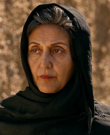 Jacqueline Antaramian headshot in a black hijab