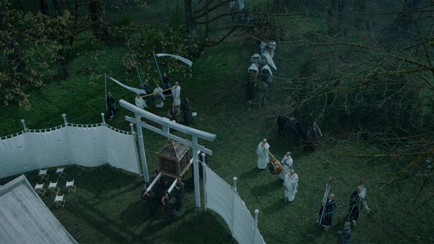 Overhead view of a Buddhist funeral ritual outdoors
