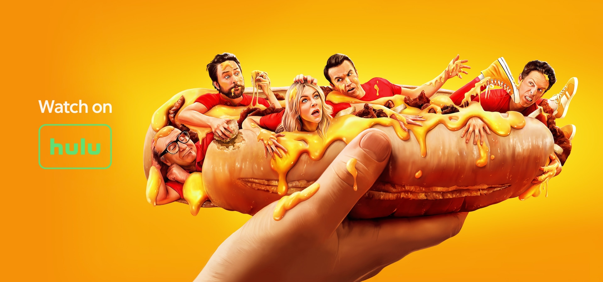 Cast of It's Always Sunny in Philadelphia laying in a hot dog with ketchup and mustard.