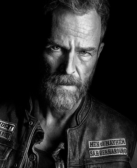 JR Bourne headshot wearing a "Men of Mayhem San Bernardino" leather jacket