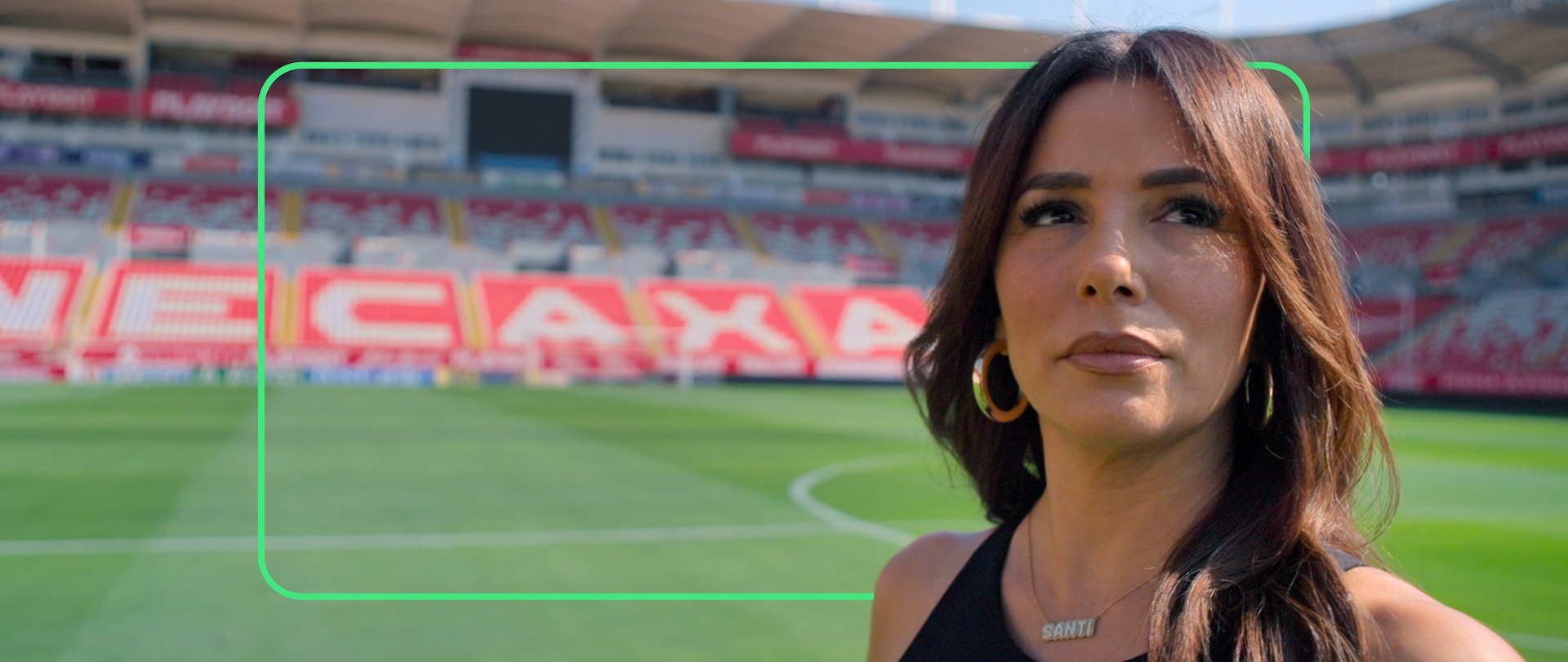 Eva Longoria hovering over Necaxa soccer players