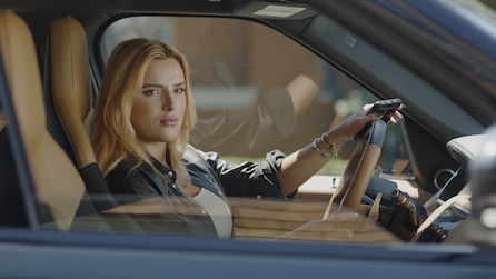 Bella Thorne as Marci behind wheel of car staring outside window in American Horror Stories Installment 2 Episode 3