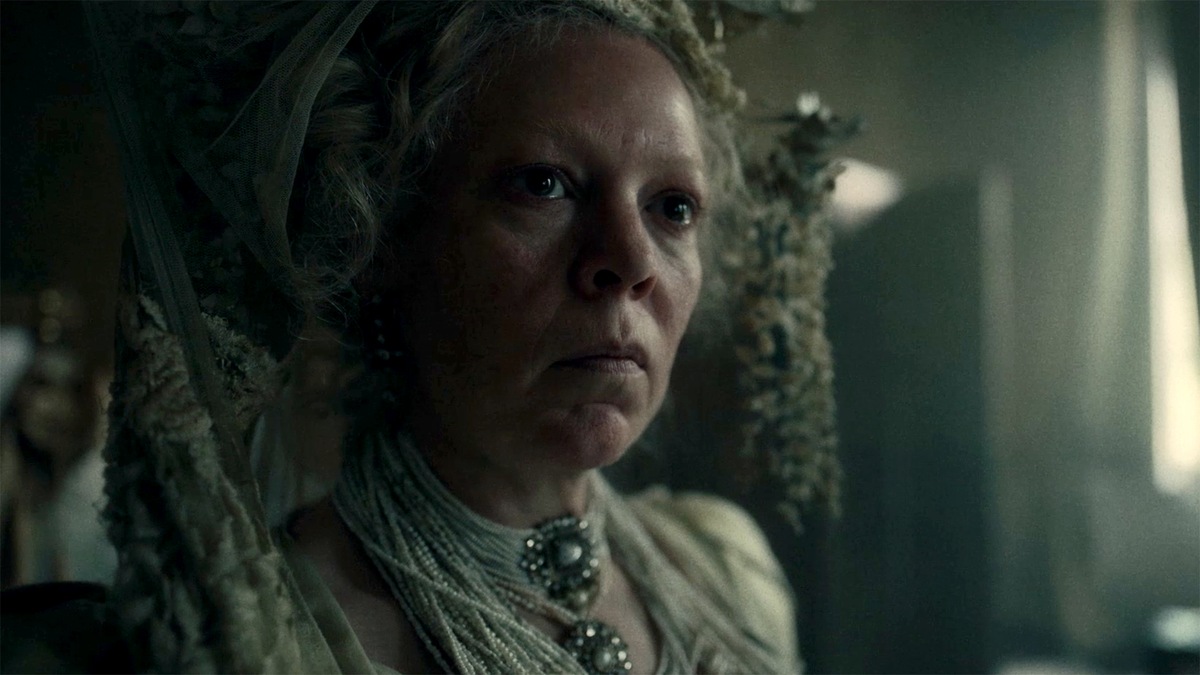 Olivia Colman in costume giving a serious look for Great Expectations