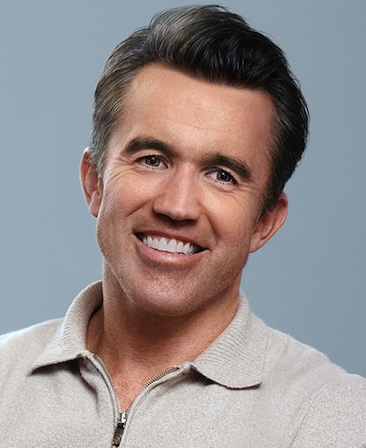 Rob Mac headshot wearing a beige zip up sweater from FX's Necaxa.