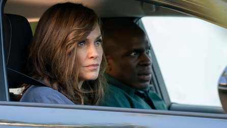 Zoe and Julian sitting in a car.