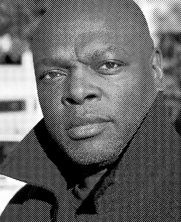 Charles Murray headshot with a black and while polka dot effect overlay