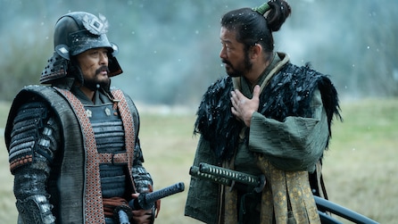Yabushige standing next to a samurai.