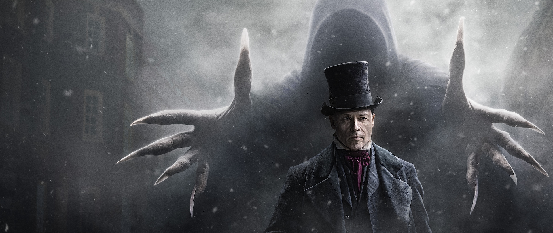 Dark shrouded spirit of Christmas Future with hands reaching out on either side of Ebenezer Scrooge dressed in dark clothes