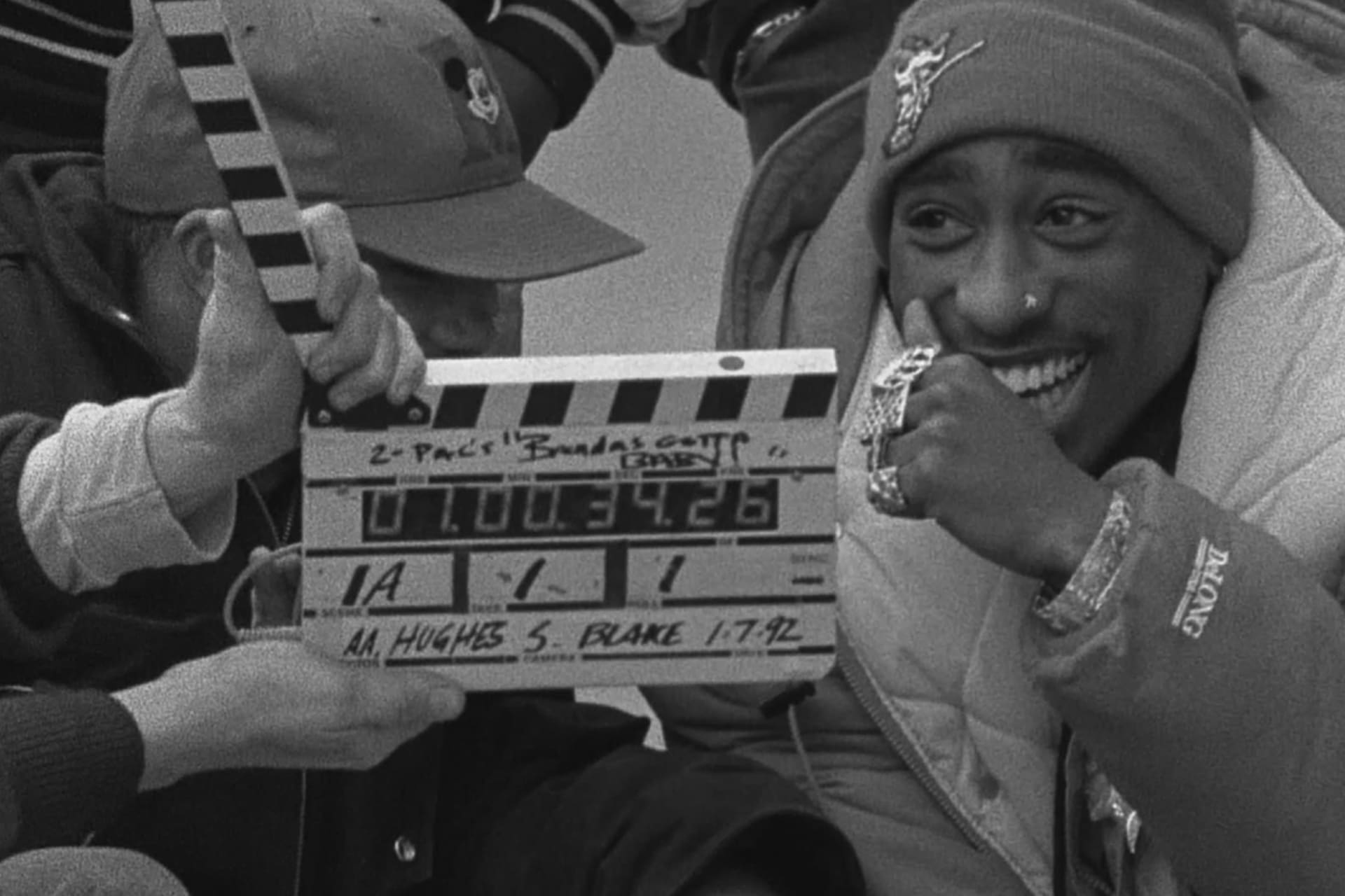 Tupac Shakur on Allen Hughes set with film slate marking time