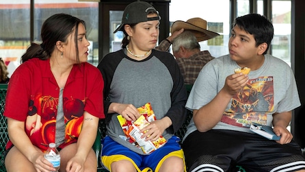 Elora, Willie and Cheese eating snacks and sitting next to each other 