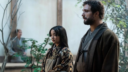 Blackthorne standing next to Mariko in a garden.