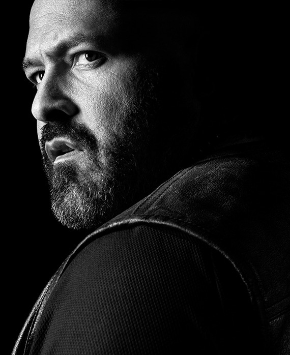 Vincent "Rocco" Vargas headshot wearing a black shirt and leather vest