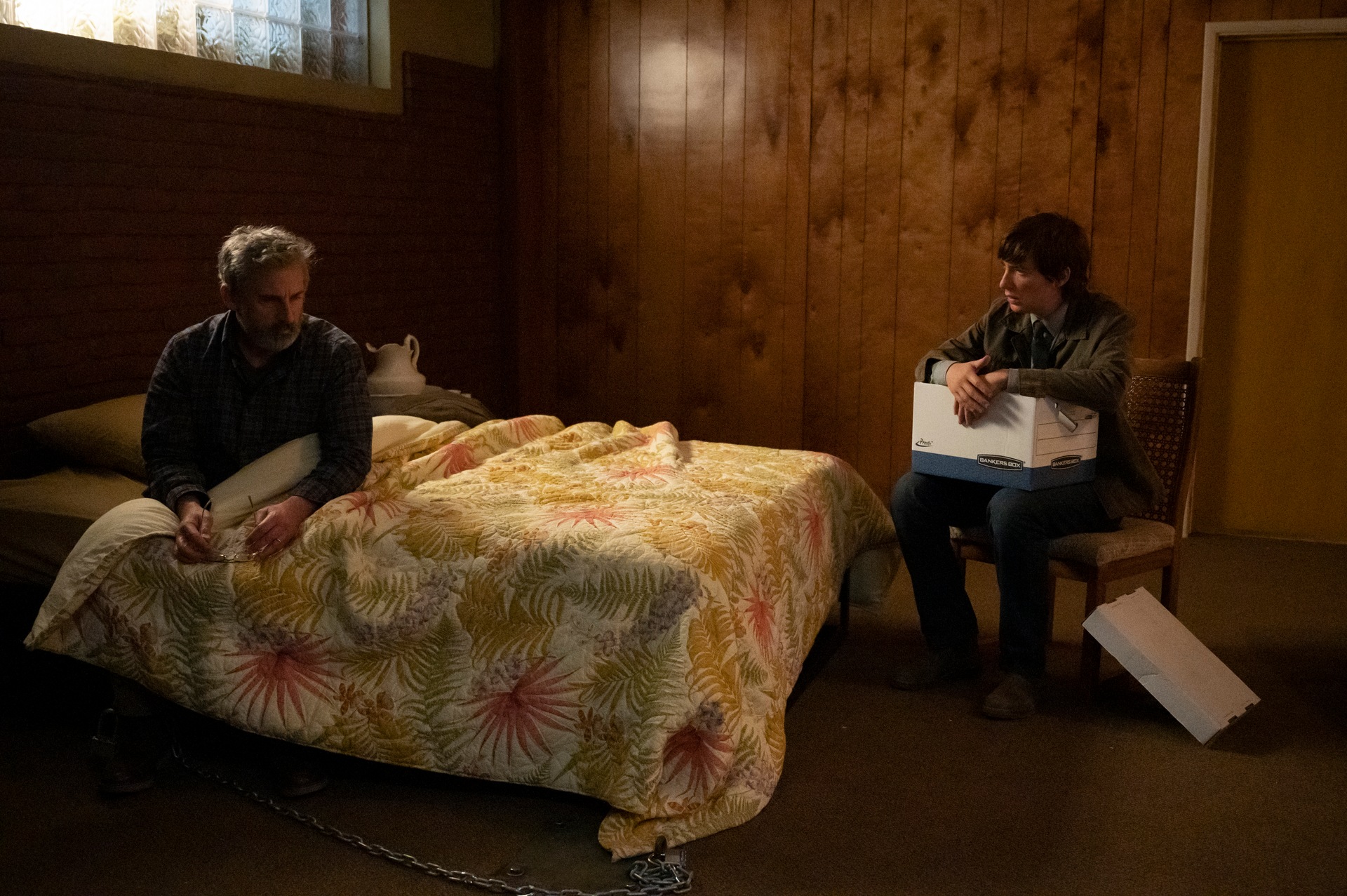 Steve Carell as Alan Strauss and Domhnall Gleeson as Sam Fortner