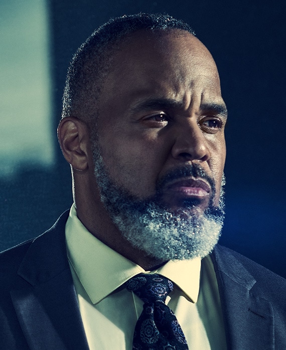 Victor Williams headshot wearing a suit and tie 