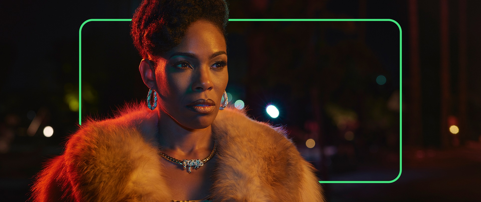 Angela Lewis as Aunt Louie styling in fur coat serving a cold stare in Los Angeles