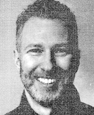Michael Blieden headshot wearing a black shirt