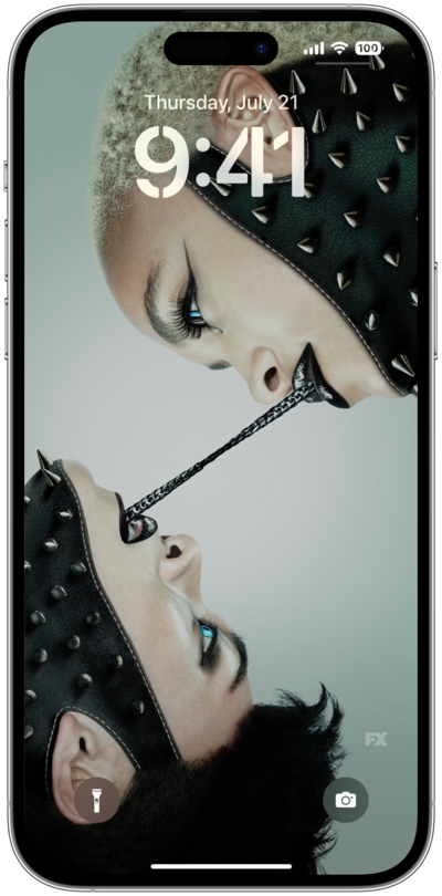 iPhone lock screen of two people with bright blue eyes connected with black metal chain from their mouths from FX's AHS NYC