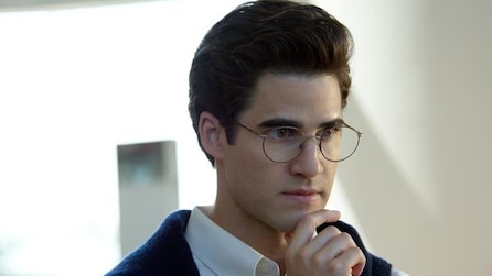 Darren Criss as Andrew Cunanan thinking with hand on chin in white button down from American Crime Story Installment 2