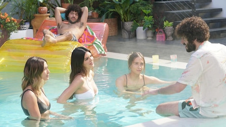 Dave sitting at poolside talking to models Kendall Jenner and Hailey Bieber in pool in FX's Dave