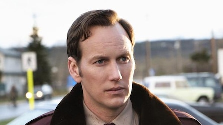Patrick Wilson as Lou outside during sunny day in parking lot by crosswalk in background in FX's Fargo Year Two