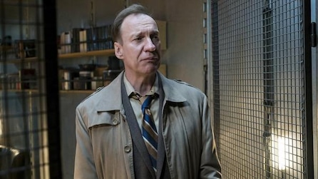 David Thewlis as V.M. Varga in trench coat inside office in FX's Fargo Year Three