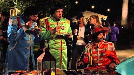 DJ Qualls as Billy in red battle outfit with red cowboy hat at party with friends in matching green and blue in FX's Legit