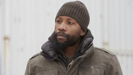 Man wearing a coat and beanie