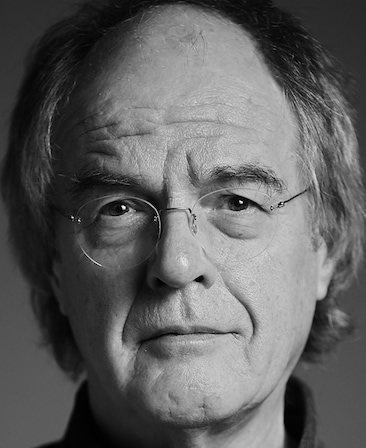 Chips Hardy Headshot wearing glasses in a black and white filter