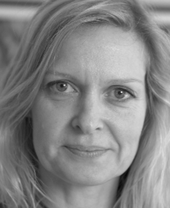 Kate Crowe Headshot smiling in a black and white filter