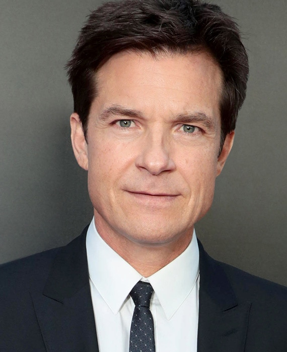 Jason Bateman Headshot wearing a suit and tie