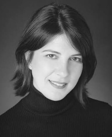 Anita Camarata headshot wearing a black turtle neck