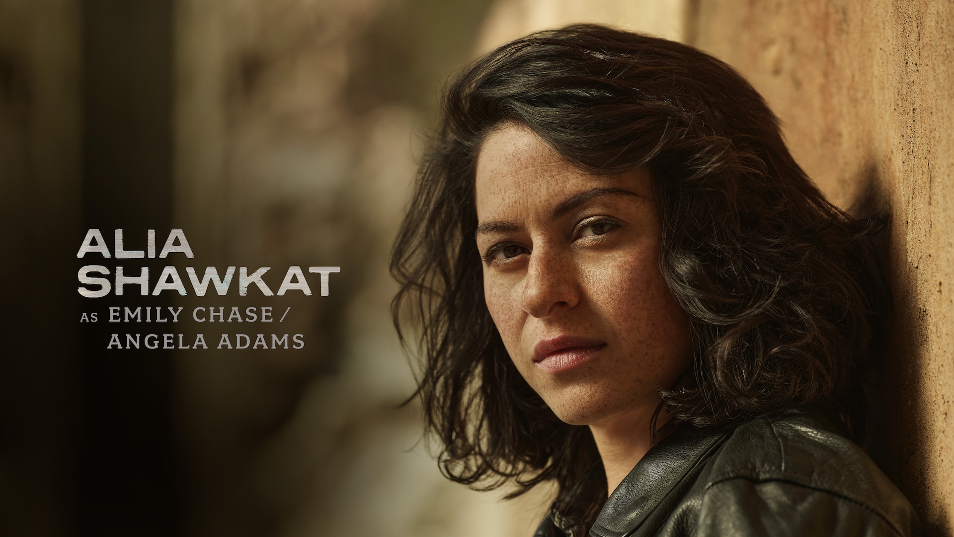 Alia Shawkat headshot wearing a black jacket