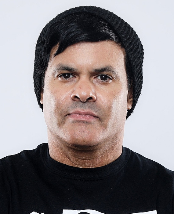 Elgin James headshot wearing a black beanie and black shirt